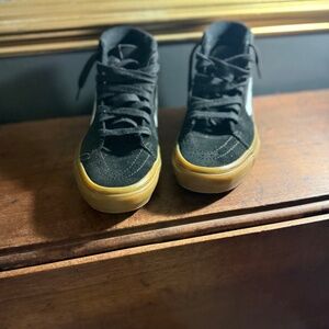 Black Vans high tops